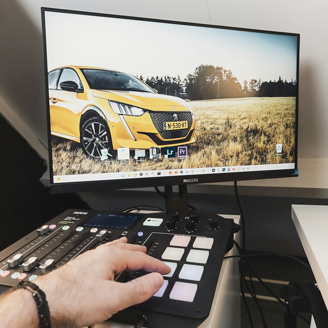 Video editor reviewing news footage on a monitor